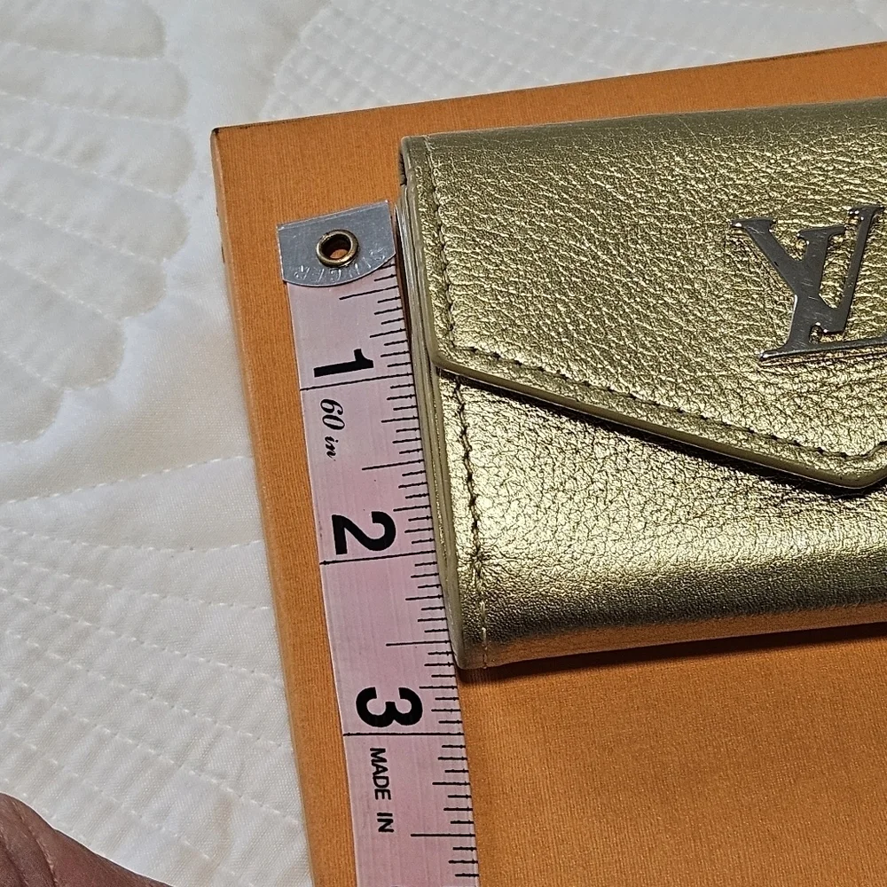 LOUIS VUITTON Portefeuille lock mini Compact Wallet Trifold Leather